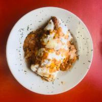 Chicken alla Vodka · Breaded chicken, melted mozzarella, creamy vodka sauce.