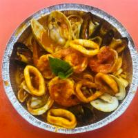 Linguini di Mare · Clams, shrimp, mussels and calamari tossed over linguini pasta.