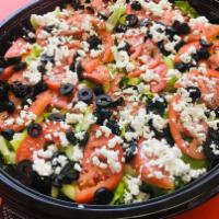 Greek Salad · Tomato, cucumber, black olives, green peppers and feta cheese, over iceberg and romaine lett...