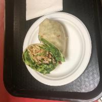 Chicken Caesar Wrap · Grilled chicken, romaine lettuce, Parmesan cheese, and Caesar dressing.