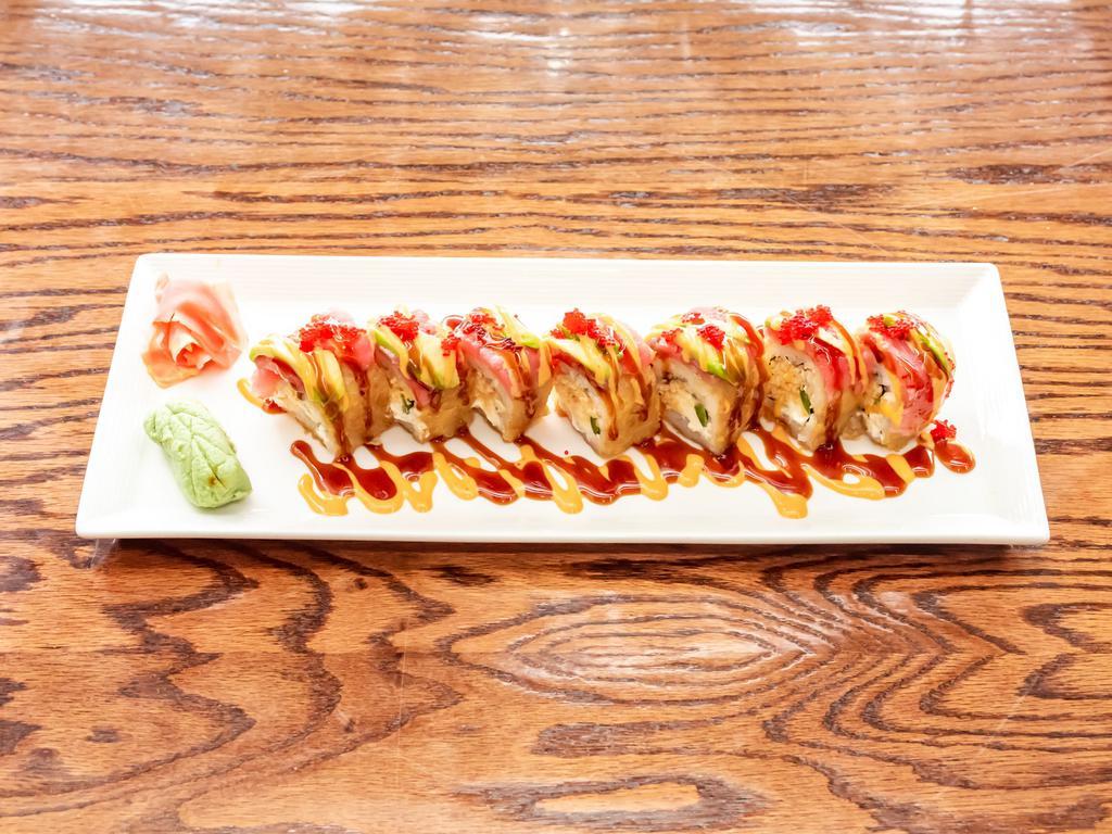 Super Volcano · Deep fried spicy crab, cream cheese, Jalapeno, topped with spicy tuna, avocado & red tobiko & special sauces  