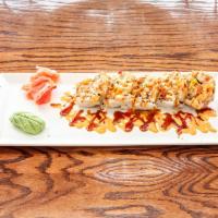 Derby roll · Tempura shrimp, avocado, cucumber, asparagus topped with torched spicy crab & special sauce  