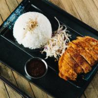 B4. Katsu Don · Fried pork cutlet with a side of steamed rice and coleslaw, served with tonkatsu sauce and a...