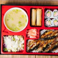 J3. Unagi Bento Box · Served with steamed rice, house salad, miso soup, veggie eggroll (2), and California Roll (4)