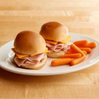 Kid's Ham and Cheese  · Nitrite-free ham, American cheese, multigrain wheat or country white. Served with choice a s...