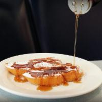 Sourdough French Toast · Thick sliced sourdough cooked light and fluffy then dusted with powdered sugar. Served with ...