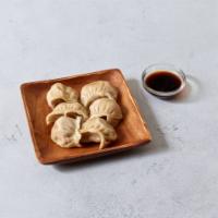 8. Chicken Dumpling · 6 pieces. Stuffed dough. 