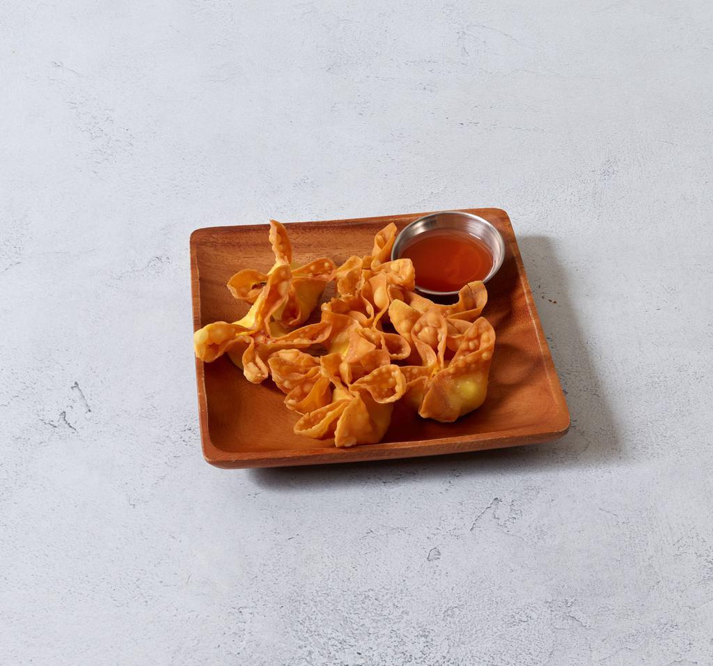 13. Crab Rangoon · 8 pieces. Fried wonton wrapper filled with crab and cream cheese.