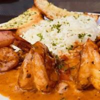 Creole Style Wild Jumbo Shrimp · Sauteed jumbo shrimp in a light and delicious creole sauce with white rice.