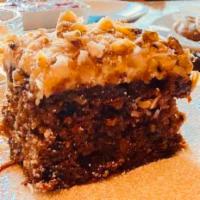 Carrot Cake · Super moist with walnuts, coconut, pineapple, carrots of course and a whipped cream cheese f...