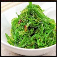 Seaweed Salad · Green seaweed and sesame seed marinated in sweet and sour sauce.