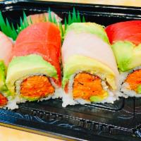 Beauty and The Beast Roll · Raw.  Avocado, spicy tuna, crunch inside, topped with tuna, yellowtail and avocado.