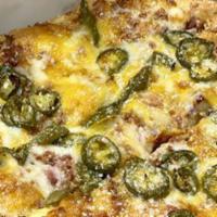 Loaded Jalapeno Bread · Bread stick topped with melted mozzarella, diced jalapeno, bacon bits and rich cheddar chees...