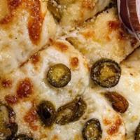 Spicy Jalapeno Bread · Diced jalapenos and mozzarella cheese give this favorite just the right amount of heat. Made...