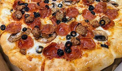 Combo Pizza · A classic combination sure to please any crowd. Pepperoni, mushroom, black olive, Italian sausage and whole milk mozzarella cheese.