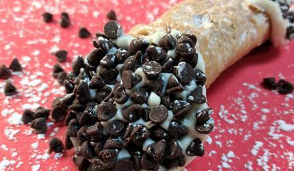 Dark Chocolate Cheesecake Cannoli · Here by popular demand. Bitter sweet chocolate paired with our rich cheesecake cannoli cream. Delish.
