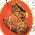 Chille Relleno  · Stuffed poblano pepper with queso fresco or picadillo covered in a poblano sauce and crema, ...