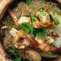 Shrimp Clay Pot · Jumbo shrimp, grass noodle, ginger, mushroom, celery and napa cabbage.
