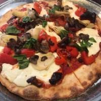 Quattro Stagioni Pizza · Mushrooms, artichokes, roasted peppers and sun-dried tomatoes. 