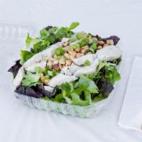 72. Chinese Chicken Salad · Sliced chicken breast, peanuts, roasted sesame seeds on a fresh mixed salad. Teriyaki vinaig...