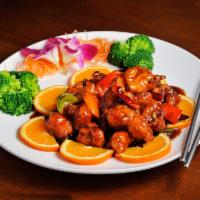 General Tso's Chicken · Deep fried tender white meat chicken breast with bell pepper and onion tossed in our chef's ...