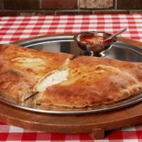 Calzone · Hand tossed dough stuffed with ricotta and mozzarella. Add toppings inside to create your ow...
