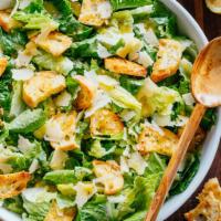 Chicken Caesar Salad · Grilled chicken, Spring mix,  lettuce, onions, croutons, shredded Parmesan cheese, and Caesa...