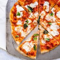 Margherita Pizza · Fresh mozzarella, Parmesan cheese, fresh basil and red sauce.