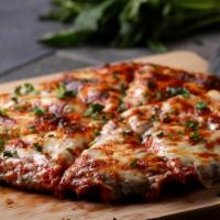 Chicken Parmigiana Pizza · Chicken with marinara sauce, basil, Parmesan, ricotta and mozzarella cheese.