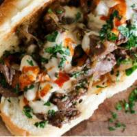 Philly Cheese Steak · Grilled Mushrooms, onions, green peppers, steak and cheese