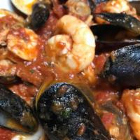 Shrimp Fra Diavolo · Served with mussels and clams in a spicy tomato sauce