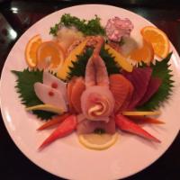 Chirashi · 15 pieces of chef's choice assorted sashimi over rice. Served with miso soup and house salad.