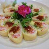Sunflower Roll (10 Pieces)  · Lobster salad, shrimp, kani, avocado, cucumber, mango, wrapped with soybean paper, banko sau...