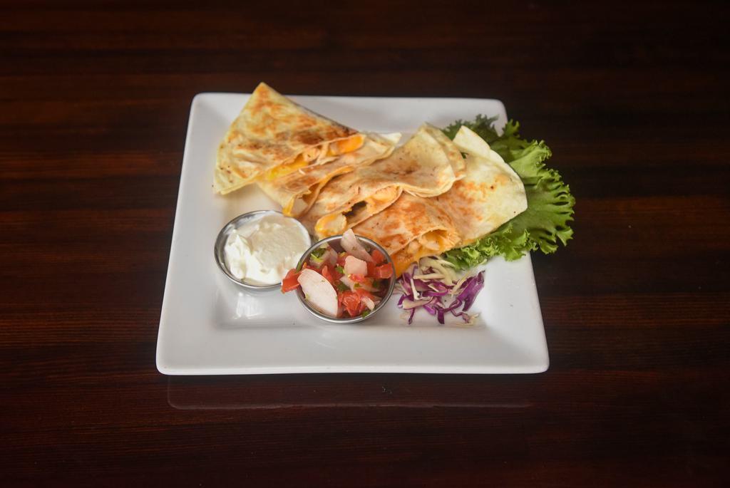 CHICKEN QUESADILLA · Chicken, cheddar-jack cheese and smoked onions in a flour tortilla. Served with pico de gallo and sour cream.