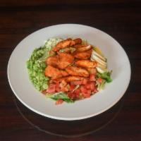 BUFFALO CHICKEN SALAD · Buffalo chicken, ranch dressing, blue cheese crumbles, egg, tomato, romaine hearts, and gree...