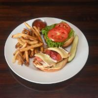 CHICKEN AND BRIE · Grilled chicken breast, Brie, apple-onion jam, tomato, lettuce and roasted garlic mayo on a ...