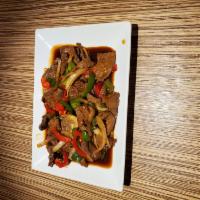  Pepper steak · Served with steak flank,  red and green bell pepper, onion,  tossed in a rich brown sauce 