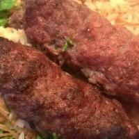 Beef Kofta - كفتة · Grilled skewers of juicy ground prime beef marinated in Egyptian spices and served over your...