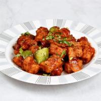 Baby Corn Manchurian · Baby corn fritters sautéed in a Manchurian style sauce made from scratch!