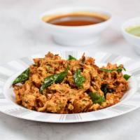 Pakoda (Fritters) · Choice of topping doused in a chickpea batter and fried to crispy perfection!
