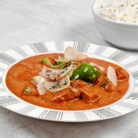 Tikka Masala Curry · Mild, creamy tomato based curry with house special herbs and simmered with protein of your c...