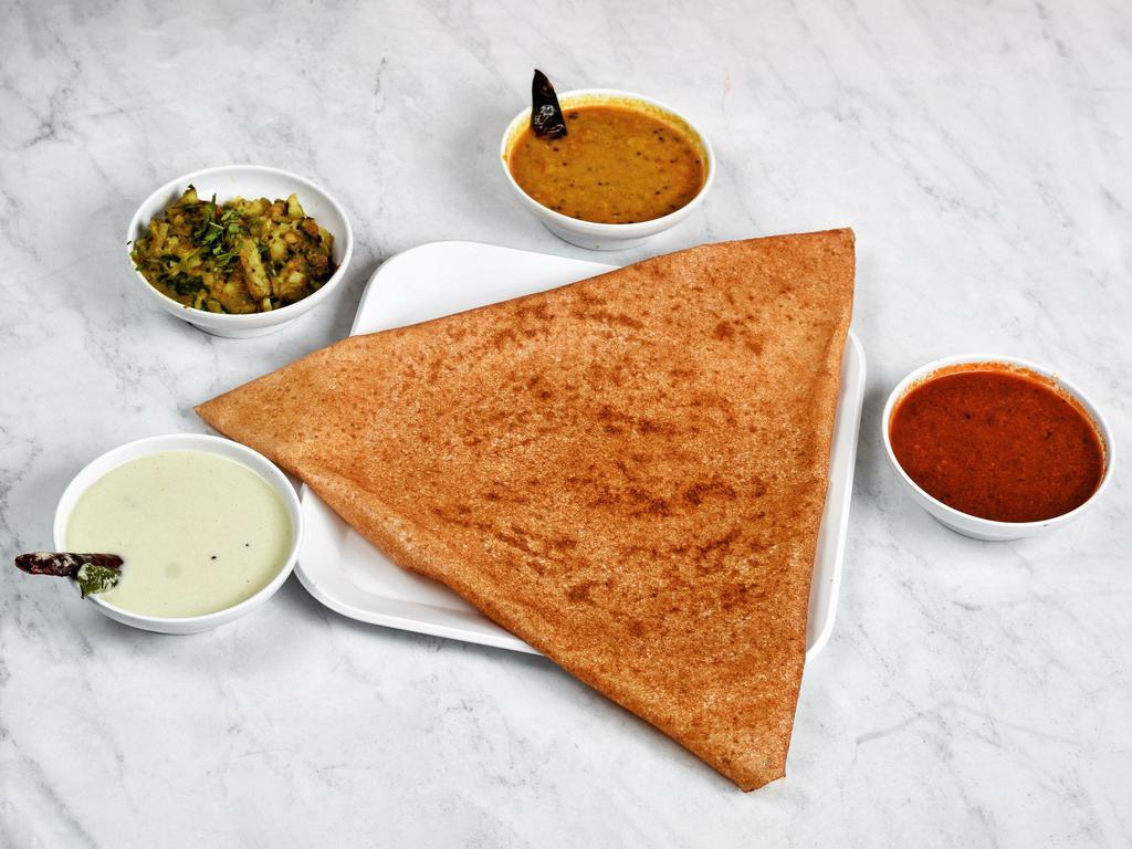 Mysore Masala Dosa - Spicy · Fermented rice crepe grilled to perfection stuffed with regional blended of spices & masala mashed potatoes served with sambar (a slightly tangy lintel vegetable stew).