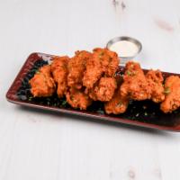 10 Pieces Wings · Chicken wings are deep fried and served with choice of sauce.
