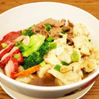 10. Combination Wonton Soup · Wonton soup with prawn, chicken, beef, BBQ pork, bok choy, broccoli, and carrot. 