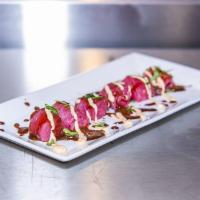 Tuna Carpaccio · Sushi Grade Tuna/Lime Soy Reduction/Sarandeada sauce