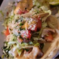 Street Tacos Seafood (Choice Of 3) · Choice Of 3 Seafood Tacos. Served With Rice And Beans.