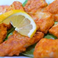 Amritsari Fish · Gluten free. Golden fried fish, lentil flour and spices.
