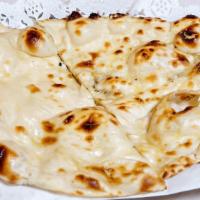 Naan (Organic) · Vegan. Traditional white flour Indian favorite topped with butter.