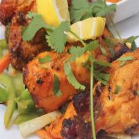 Nashila Chicken Tandoori (GF) · Chicken on Bone, Beer Marinated and Spices