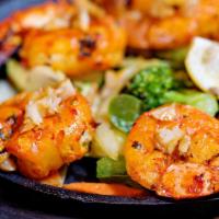 Tamarind Shrimp · Gluten-free. Jumbo shrimps with a hint of garlic. Tandoor is a clay oven, marinated freshly ...